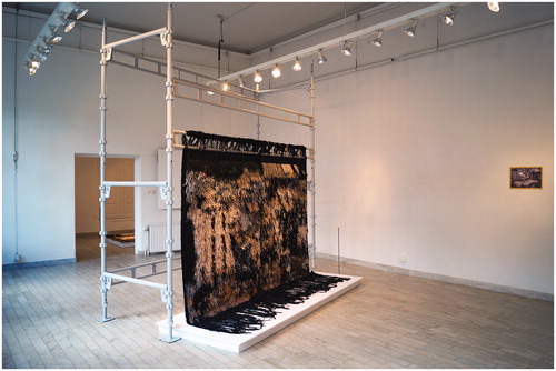 Figure 18 Installation view of Emelie Röndahl, Rana Plaza – the Collapse (April 24, 2013) (2015–16) in the Referensverk (Reference Works) exhibition at Handarbetets Vänner, Stockholm (April 6 – May 14, 2016).