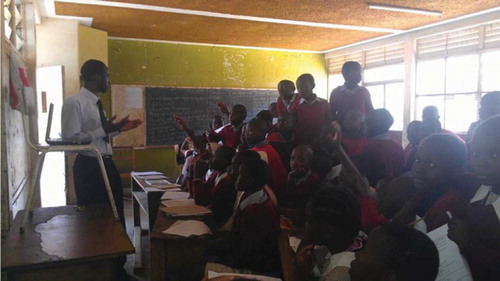 Fig. 3 Medical student conducting NCD Training at Toi Primary School, Nairobi, Kenya.
