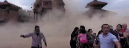 Figure 1. Temples collapsing in Bhaktapur’s Darbar Square during the earthquake of 25 April 2015.  Still from a widely recycled video clip, taken here from video of Prakash Katuwal’s “Ayo Barai”.