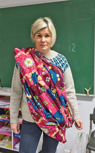 Figure 1. Teacher Clara wearing a ‘malong’ in front of the class. (Photo: Anne Birgitte Fyhn).