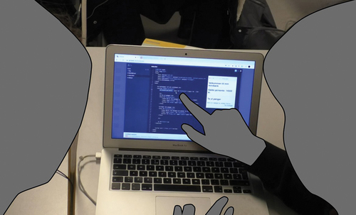 Figure 2. Students G (left) and B (right) focusing their attention on parts of the code using digital and physical gestures. The code is written in JavaScript.