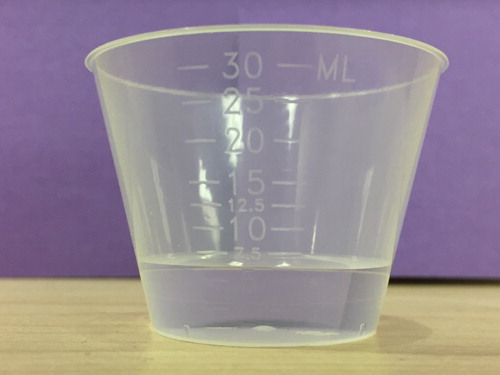 Figure 2. Medicine cup with water added by the child's mother when asked to demonstrate 1 mL.