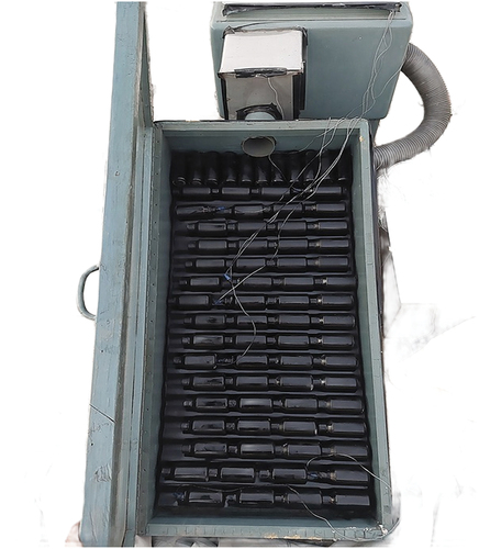 Figure 3. Solar flat plate collector loaded with PCM containers.