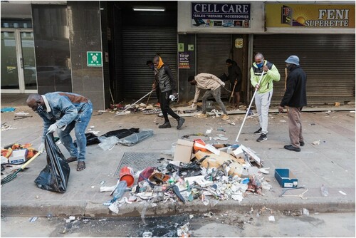Figure 2. Clean-up efforts by volunteers in the Durban CBD (Photograph by Rajesh Jantilal).