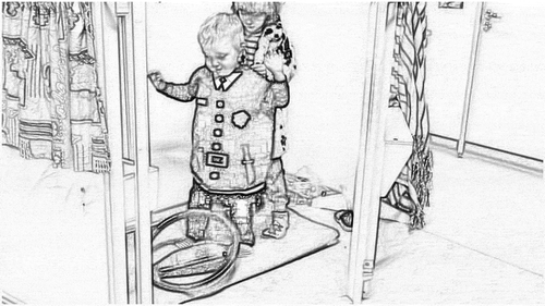 Figure 5. Boys dressing for pretend socio-imaginative play of police, with one boy dressed as an officer and the other as a detection dog
