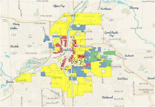 Figure 6. Grand Rapids. This figure shows the A rated parcels (Green), B rated parcels (Blue), C rated parcels (Yellow), and D rated parcels (Red) in Grand Rapids. The black dots represent parcels held by the Michigan State Land Bank (SLBA).