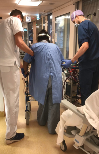 Figure 1. Ambulation with support of a multidisciplinary team while on ECMO.