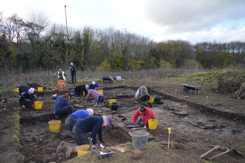 Figure 5. Excavation at Llys Edwin, with participants undertaking a wide range of archaeological activities. Photo: CPAT 4428–0090 © CPAT.