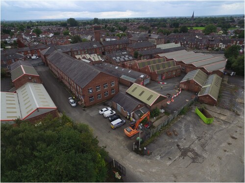 Figure 15. Aerial view of the Offerton Hat Works, showing the processing buildings to the rear of the main trimming and finishing range (© University of Salford).