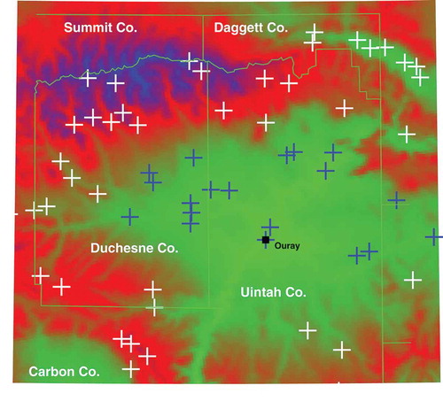 Figure 3. Map showing the Uintah Basin. White and blue crosses indicate locations of all surface temperature and snow depth stations consulted, whereas the blue crosses give the locations of those stations finally chosen, following an analysis explained in the text, as typically lying under the inversion layer. The town of Ouray is the site of the ozone observations used in this study. The vertical relief extends from about 1350 m above sea level (asl) (green) to about 4125 m asl (blue), with the floor of the basin at about 1400 m asl.