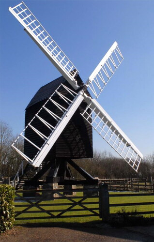 Figure 2. Bourn Windmill (Cambridgeshire). Note the open trestle supported on brick plinths, pitched roof shape and two plain sails (photo: Martin Davies)