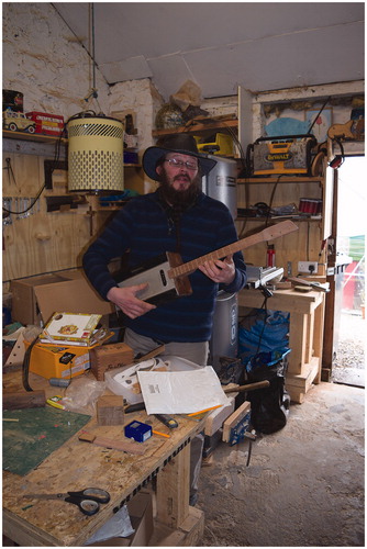 Figure 4 Woofie in his workshop with a “Roberts Radio” guitar.