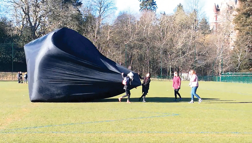 Figure 1. A still image from a video of students inflating one of the Aerocene sculptures, video made by a student. Courtesy of the author.