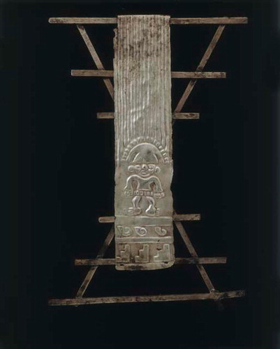 Figure 23. Miniature loom with textile. Silver. Dimensions: Overall: 15.5 × 10.3 × 1 cm (6 1/8 × 4 1/16 × 3/8 in.). Gift of Alfred M. Tozzer and Donald Scott, 1946 © President and Fellows of Harvard College, Peabody Museum of Archaeology and Ethnology, PM 48-37-30/7162.