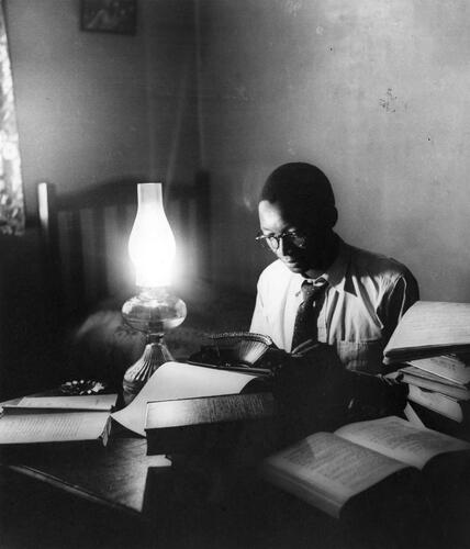 Figure 2. Can Themba photographed by Jürgen Schadeberg. (‘£50 Winner of Short Story Contest’, Drum, April 1953, p. 21. Copyright © Jürgen Schadeberg – Baileys African History Archive / Africa Media Online / african.pictures.)
