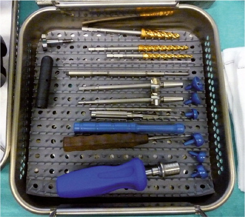 Figure 27. The instrument set for the arthroplasty surgery. Reamers with lower cutting threads, blunt guidewires, quick lock screwdriver and trials for tension and stability adjustment.