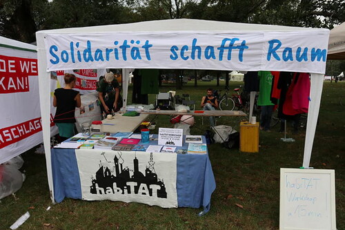 Figure 4. “Solidarity creates Space” - habiTATinformation desk at the Volksstimme Festival in Vienna. Source: Hanke, Citation2019.