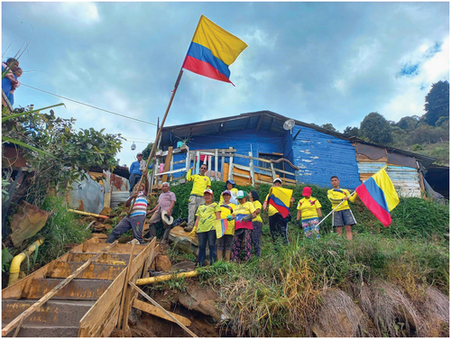 Figure 7. Medellín Practicum Studio CU Boulder Community Carpinelo 2, Community Garden, Medellín, Colombia, Oct. 6, 2022. An event commemorating the last pouring of concrete for the steps to the highest house of Carpinelo 2, Calle 107a. (Credit: Adolfo Taborda)