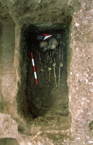 Fig 3 Multiple burial of two children in the cemetery west of the priory at St Gregory, Canterbury. Both children were approximately two years old at death and the grave dates to the 12th century. © Canterbury Archaeological Trust; reproduced with permission.