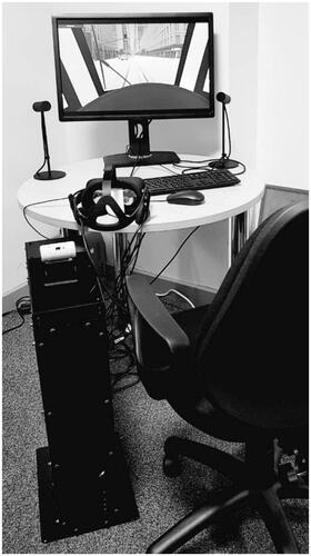 Figure 5. Tram VR simulator including the master tram controller and the Oculus rift head-mounted display (HMD) providing the first-person view of the simulated environment.