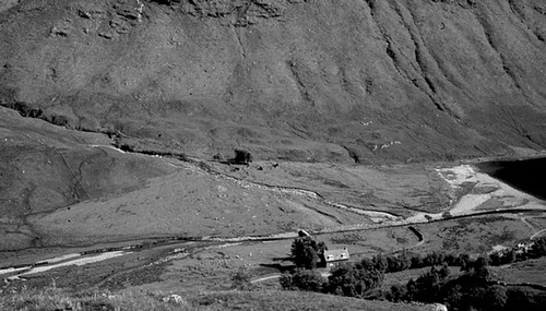 Figure 20 Relict Holocene alluvial fan in Glen Elchaig, Kintail. The parent stream has incised the upper fan, and most of the fan is now vegetation-covered and inactive