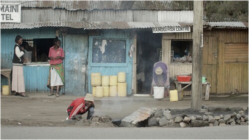 Figure 2. Roadside shops in workers’ settlement (film still, © Anna Lisa Ramella and Ben Bernhard).