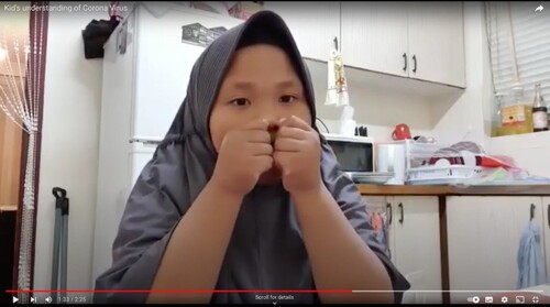 Figure 14. Ghina demonstrating covering mouth and nose with a tissue when coughing. © Play Observatory PL145A1/S001.