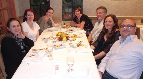 Altogether now! A rare photo of CBRL staff from our offices in London, Jerusalem and Amman all in one place while attending a finance training course in Amman. From left to right: Carol Palmer (British Institute in Amman Director), Penny McParlin (CBRL London Administrator), Francesca Burke (BI Amman Research Fellow), Mandy Turner (Kenyon Institute Director), Bill Finlayson (CBRL Regional Director), Micaela Sinibaldi (valued friend of the CBRL) and Firas Bqa’in (BI Amman Events Administrator). Maida Smeir (KI Administrator) and Nadja Qaisi (BIA Finance Administrator) excused themselves to do a little shopping instead of attending the dinner pictured. Taken in Amman, October 2013