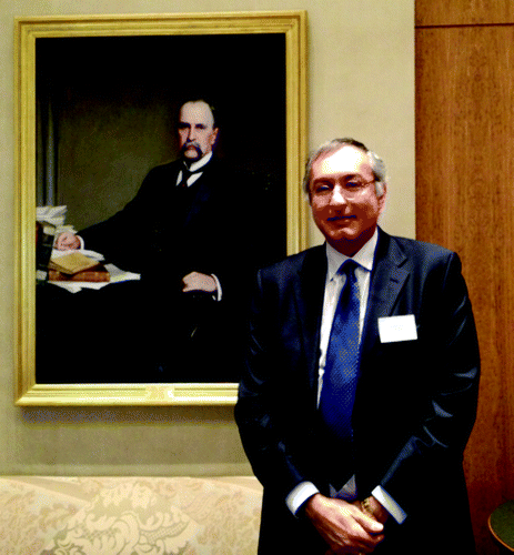 Figure 3. Photo of Dr El-Deiry in front of portrait of Sir William Osler at the Johns Hopkins University School of Medicine on April 7, 2014. Sir William Osler served as Physician-in-Chief at the Johns Hopkins Hospital from 1889 to 1905 and as Dean of the Medical Faculty at The Johns Hopkins School of Medicine from 1898 to 1899. He founded the Interurban Clinical Club in 1905 before leaving Johns Hopkins for Oxford where he served as Regius Professor Of Medicine at Oxford University from 1905 to 1919. Dr El-Deiry served as President of the Interurban Clinical Club (2013–2014), Secretary/Treasurer (2008–2013), and Councilor for Philadelphia (2007–2009).