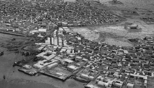 Figure 7. A typical vernacular Qatari neighborhood in the past. Source (QNDF Citation2014).