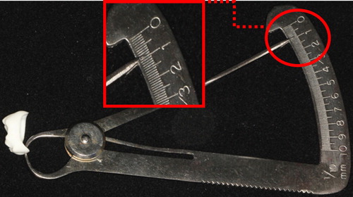 Figure 3. Thickness measurement on the edge of a stereolithography-fabricated ceramic crown after sintering.