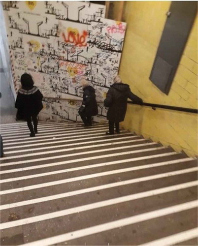 Figure 2. Out-of-order escalator turning subway stairs into an obstacle for two elderly ladies (Dagmar van de Schraaf. Oct. 2017).