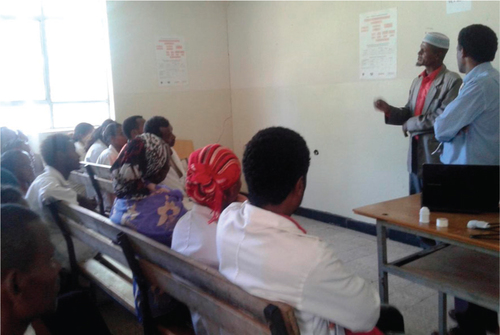 Fig. 3 Mr B explaining about his illness and recovery to primary care staff during a training programme to initiate integrated care at the facility. Photo by Sr. Medhin Selamu.