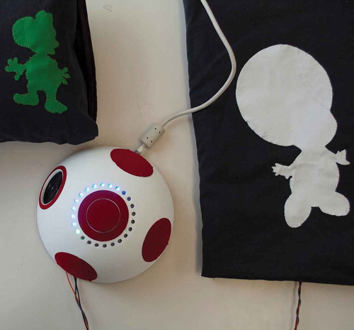 Figure 13. The rattle alarm system – Developed together with Mia – left: cushion, middle: alarm clock, right: pressure mat.