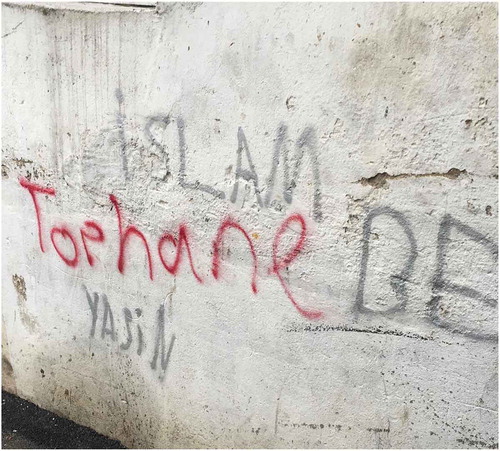 Figure 2. Tophane tag in side street. Photo credit: Author