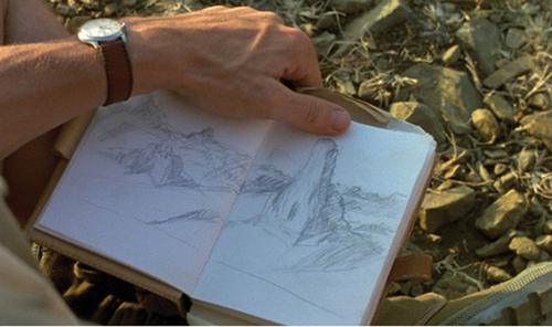 Figure 3. A drawing depicting an African landscape in Marc Dalens’s diary, in its owner’s hands (Chocolat).