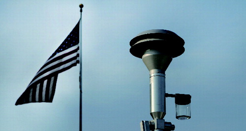 Figure 1 PM2.5 monitoring device mounted on the roof of the U.S. Embassy in Beijing (Source: Reuters/U.S. Embassy Press Office).