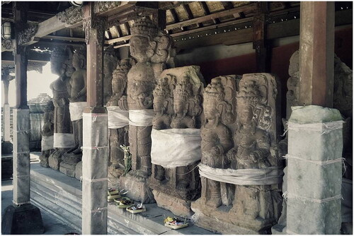 Figure 3. Kriya Statue of Raja and Ratu with kebalian style found in Puncak Penulisan Temple (Sayoga, Citation2016).