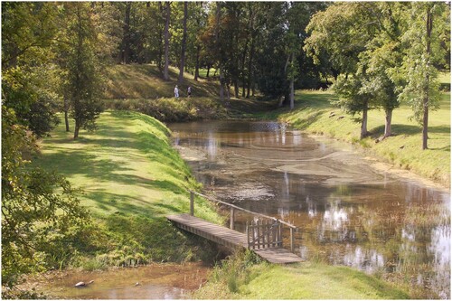 Figure 4. Lyveden, Northants. Sir Thomas Tresham’s great water gardens were never finished, and the west arm of the moat was left undug. This view looks along the south arm of the moat towards the prospect or ‘snail’ mound at its corner. (Photo: Paul Stamper.)