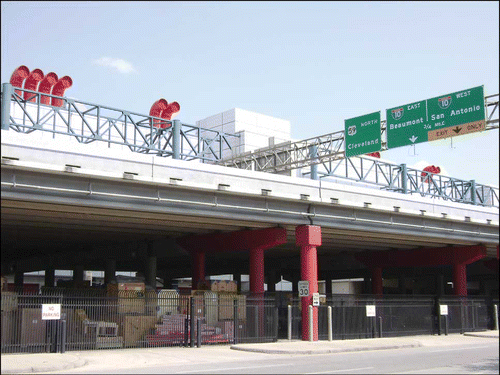 Fig. 4. Eastex Freeway (U.S. 59) and back service entrance of George R. Brown Convention Center, as seen from Old Chinatown.