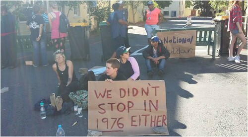 Figure 1. Fees must fall protest in action at the University of Cape Town, Hiddingh Campus. (Source: Authors’ own photograph.)