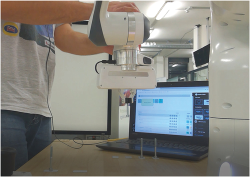 Figure 9. Setup of the pick-and-place application used in the evaluation in the TU Wien Industrie 4.0 pilot factory in Vienna, Austria.