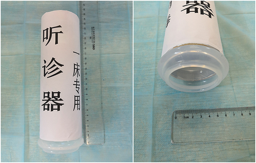 Figure 1 A cylindrical tube stethoscope made of a hollow potato chip packaging barrel (diameter: 6.5 cm, length: 20 cm) covered by a piece of A4 paper sprayed with 500 mg/L chlorine dioxide. A silicone gasket matched with the barrel was installed on the auscultation side to avoid sound leakage from the stethoscope.