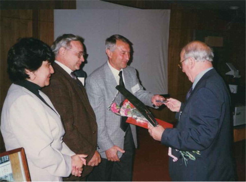 Figure 2.6. (colour online) Freedericksz Medal award to G.W. Gray in Peterhof Palace (St. Petersburg). From right to left: G. Gray, E. I. Ryumtsev (Director of the Institute of Physics under the Saint-Petersburg State University), S.A. Pikin (Chairman of the Committee of the Russian Liquid Crystal Society), S.I. Torgova (the Secretary of the Committee). © [L. M. Blinov]. Reproduced by permission of L. M. Blinov.