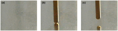 Figure 2. Photograph of the sample surface before and after electrode landing and retraction: sample placed on measuring table (a), electrode landed (b), electrode retracted (c). The diameter of electrode was about 1 mm, the contact area was about 1 × 10−4 cm2.