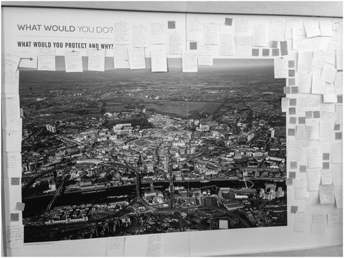 Figure 5. The large oblique aerial photograph posted on backboard of Newcastle and part of Gateshead inviting visitors to the exhibition to pinpoint areas and buildings they wished to protect and post comments on places they wished to see change. Source: authors.