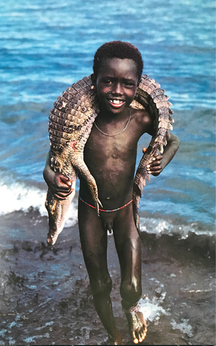 Figure 4. A boy from Elmolo at Lake Turkana. Photograph included in the book Cradle of Mankind (1981).