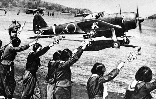 Figure 3 Chiran high school girls waving off a kamikaze pilot