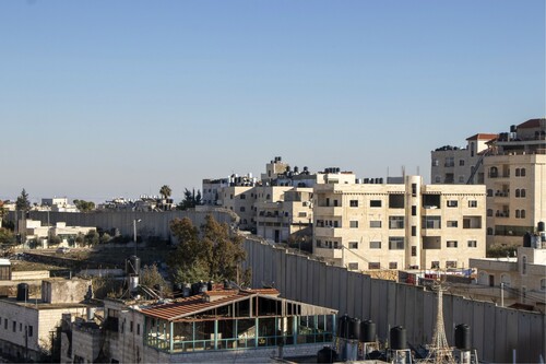 Figure 6: The wall cutting through the urban fabric (Photo: Huda Abuzaid).