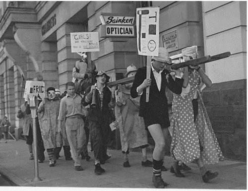 Figure 5. Students marching down St Georges Terrace to advertise the T Square Ball, 1960. Private Collection, Donald Newman.